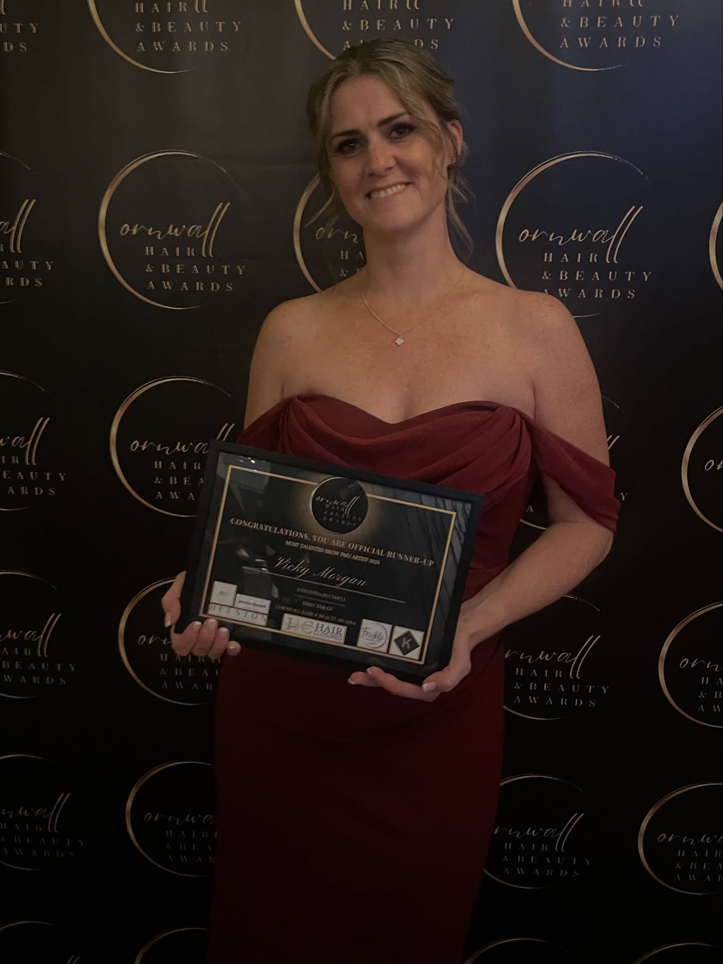Vicky with her award certificate at the Cornwall Hair & Beauty Awards
