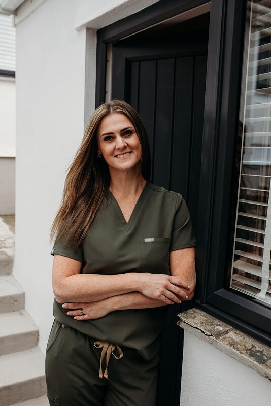 Vicky at the clinic door
